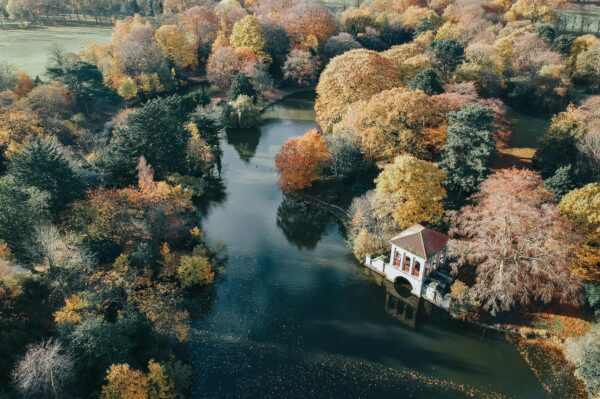 Aerial shot of Birkenhead Park's Serpentine lake and with Roman Boathouse